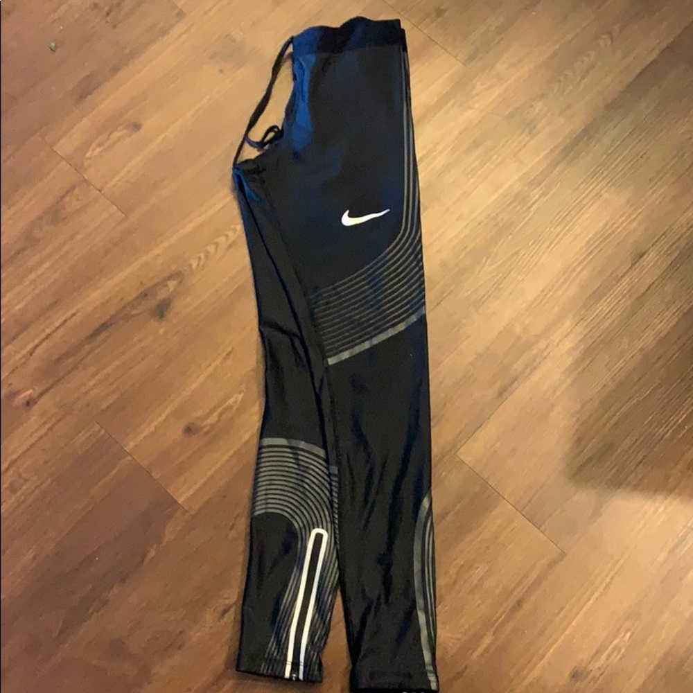 Nike long tights with ankle zipper - medium